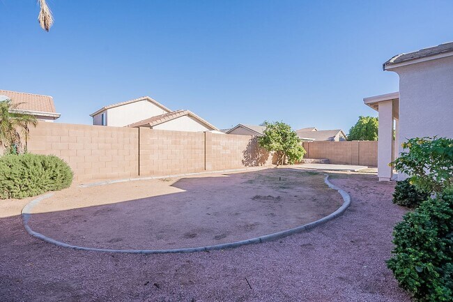 Building Photo - Fantastic home with Solar & a den!