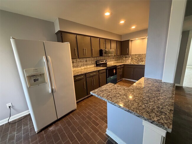 Building Photo - 5212 Arboles Dr