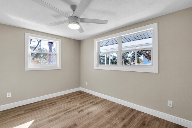 Building Photo - A spacious 3-bedroom, 2-bath layout provides plenty of room for family and guests!