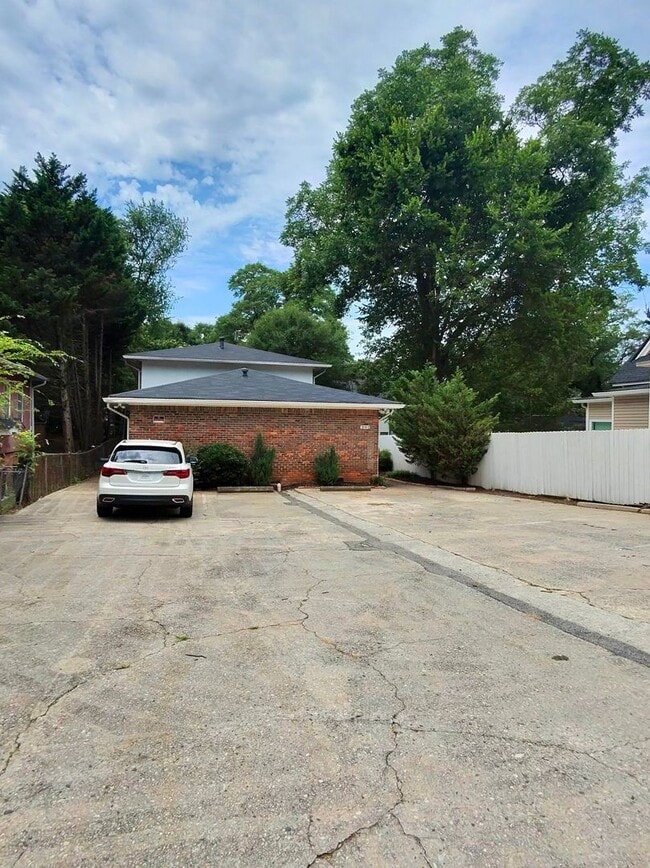 Building Photo - Fully Renovated East Point Gem – Minutes f...