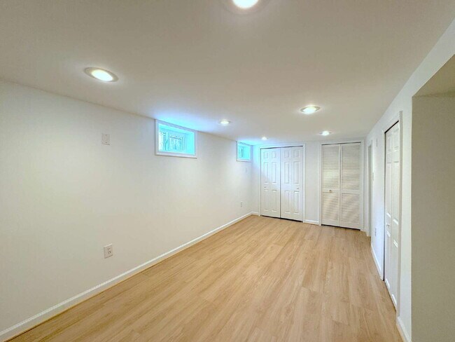 Building Photo - Charming 2BR Townhome with Finished Basement, Fenced Yard & Private Driveway Near Huntington Metro