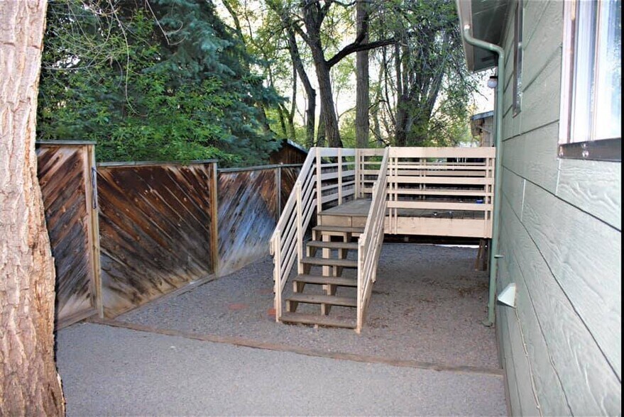 Backyard looking towards the back kitchen door and deck - 1228 Maple Street