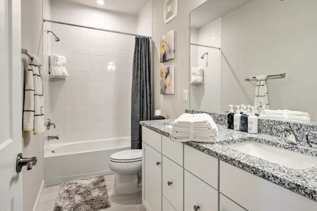 Building Photo - Luxury 3BR/2.5BA Condo w/ Balcony and Rooftop Terrace & Garage – Walk to One Loudoun