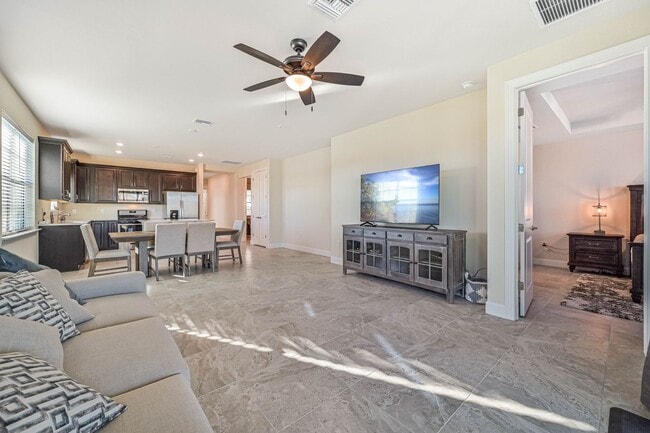 Building Photo - **Coach Home w/ Private Pool in Esplanade Lake Club **