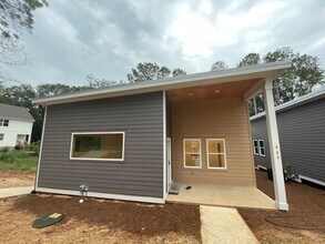 Building Photo - NEW CONSTRUCTION 5 BEDROOM PRE-LEASING FOR...