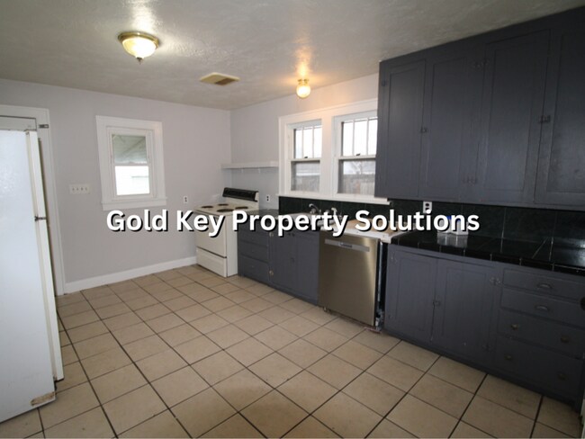 Building Photo - Large 2 BR 1 BA House with Family Room, Basement, Garage, and Separate Storage Building (SECTION ...