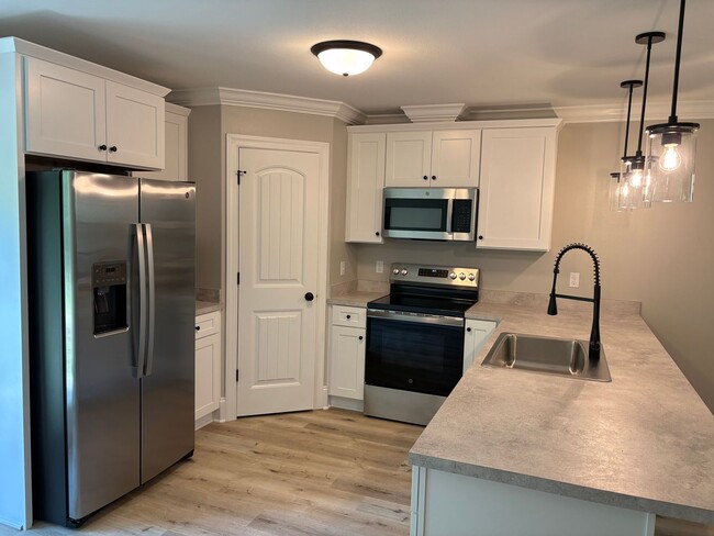 Building Photo - New 4 Bedroom Home Available Now