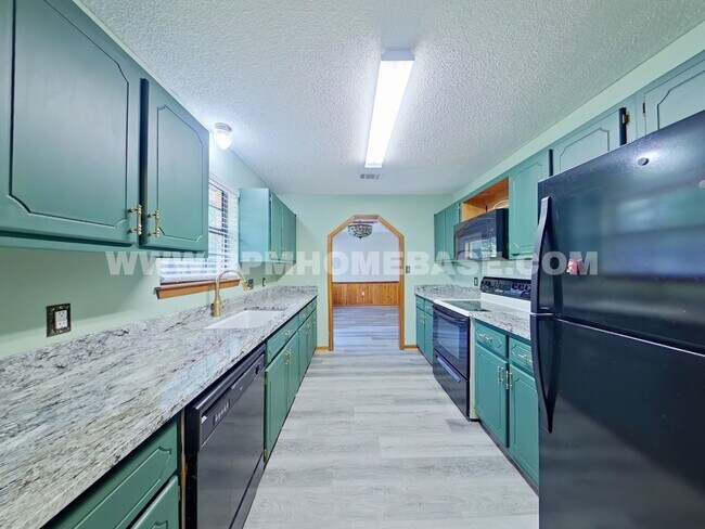 Building Photo - Move-In Special | Charming 3-Bedroom Corner Lot Home with Spacious Backyard and Convenient Location