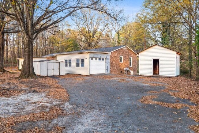 Building Photo - McLeansville - Minutes from Elon & Greensboro! Few Acres, Brick Duplex, Just Painted, New Carpet,...