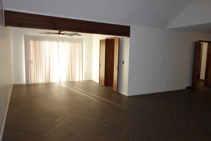 In living room looking back towards the dining area - 7116 S Indianapolis Ave