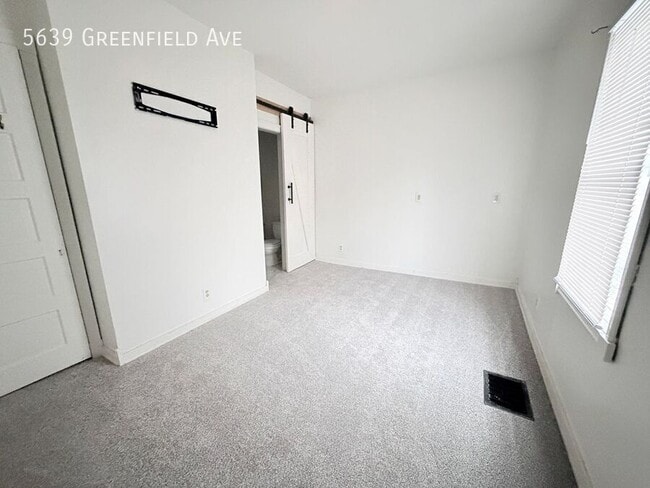 Building Photo - 5639 Greenfield Ave