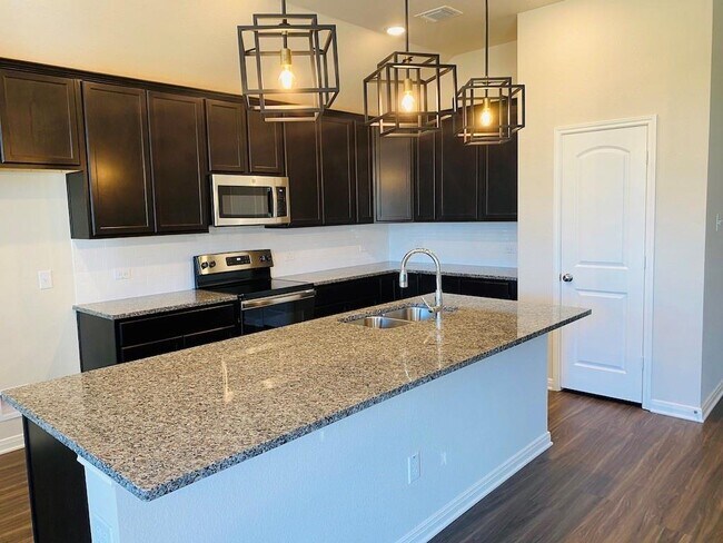 Building Photo - 5205 Leaning Tree