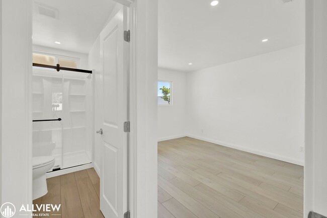 Building Photo - Fully Renovated 4-Bedroom Home with Firepl...