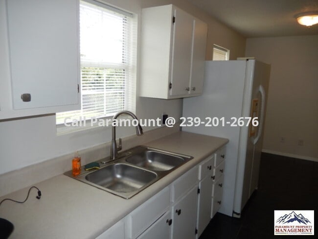 Building Photo - Won't Last Long!  Unique Lehigh Home with Fenced Yard