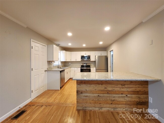 Building Photo - 6618 Hartsell Pl