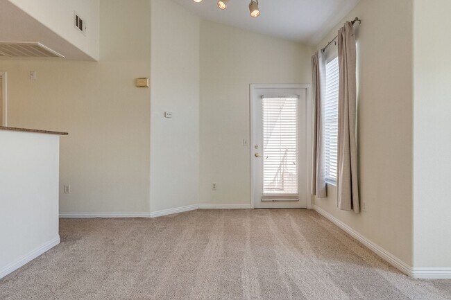 Building Photo - Move-In Ready Condo with Private Balcony & Modern Upgrades