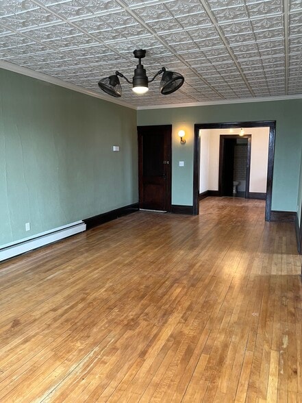 Living Room into Dining - 415 E Saint Germain St