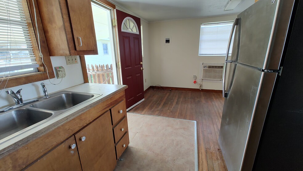 kitchen to living room - 922 E Nezpique St