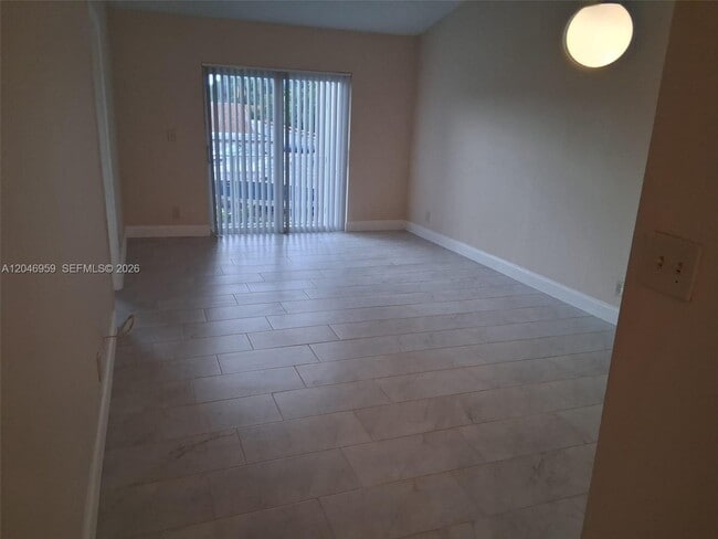 Building Photo - 10907 Royal Palm Blvd