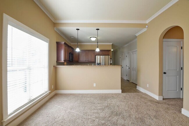 Building Photo - Like-New One-Level Brick Home with Private Patio