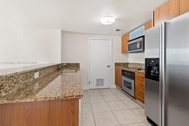 Building Photo - 9055 SW 73rd Ct