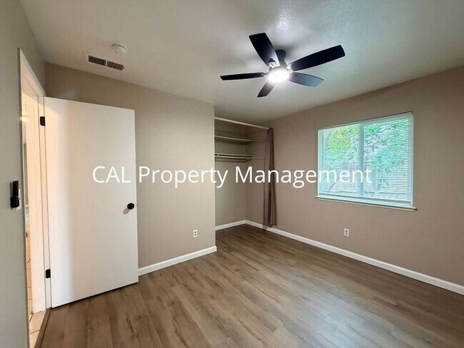 Building Photo - Spacious 4-Bedroom Home with 2-Car Garage & Backyard Oasis