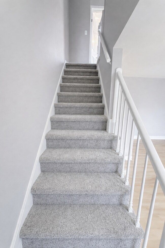 Building Photo - Home with Modern Kitchen, Finished Basement & Backyard Deck