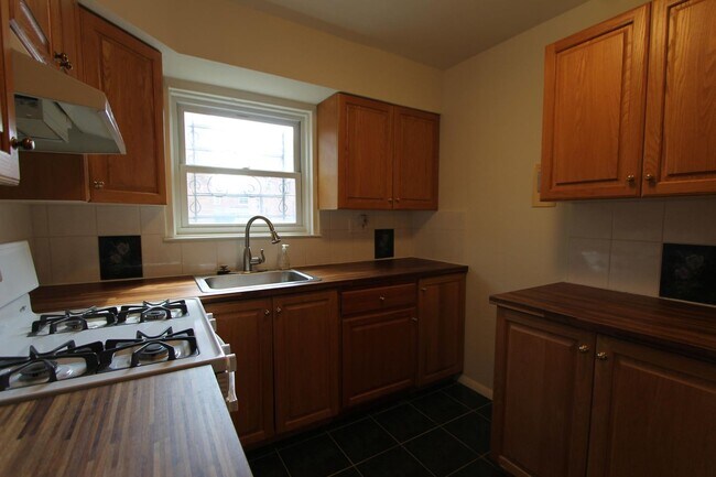 Building Photo - 8244 Woolston Ave