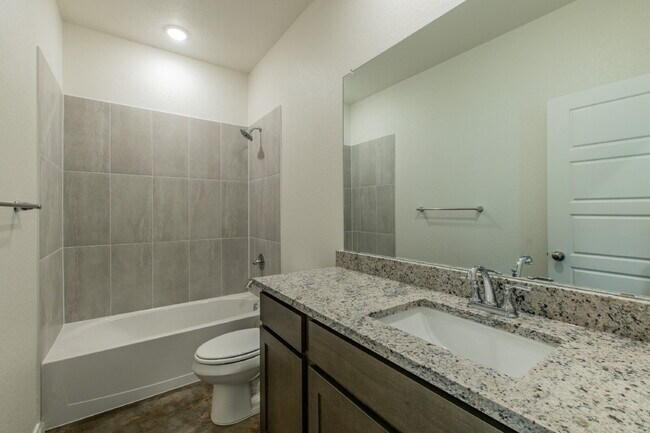 Building Photo - Brand New 3BR Duplex with Modern Concrete Floors & Fenced Yard!