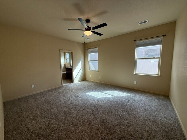 Building Photo - Beautiful 4 bedroom, 2 bath, 3 car garage ...