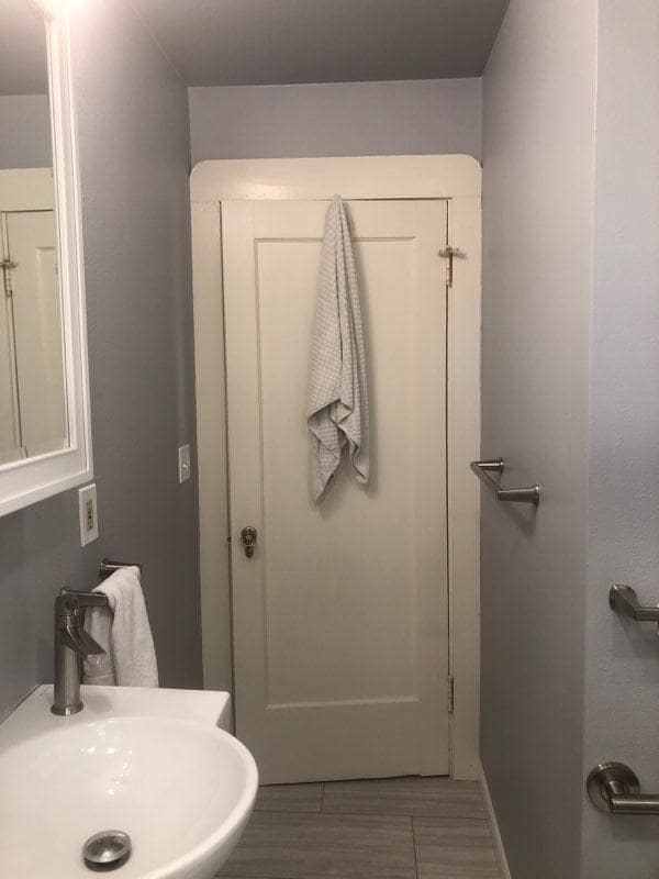Bathroom with door closed looking from sink. - 8528 SW 35th Ave