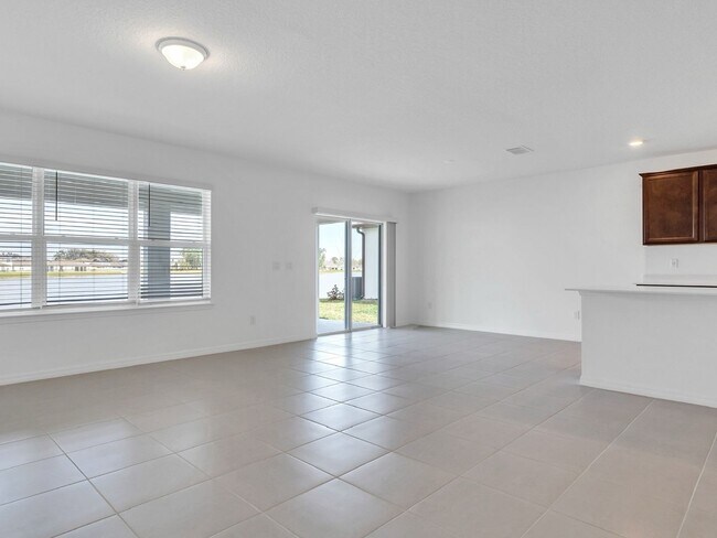 Building Photo - Stunning 4-Bedroom Home with Pond Views in...
