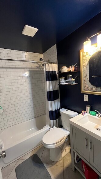The shared upstairs bathroom - 127 S Jordan St