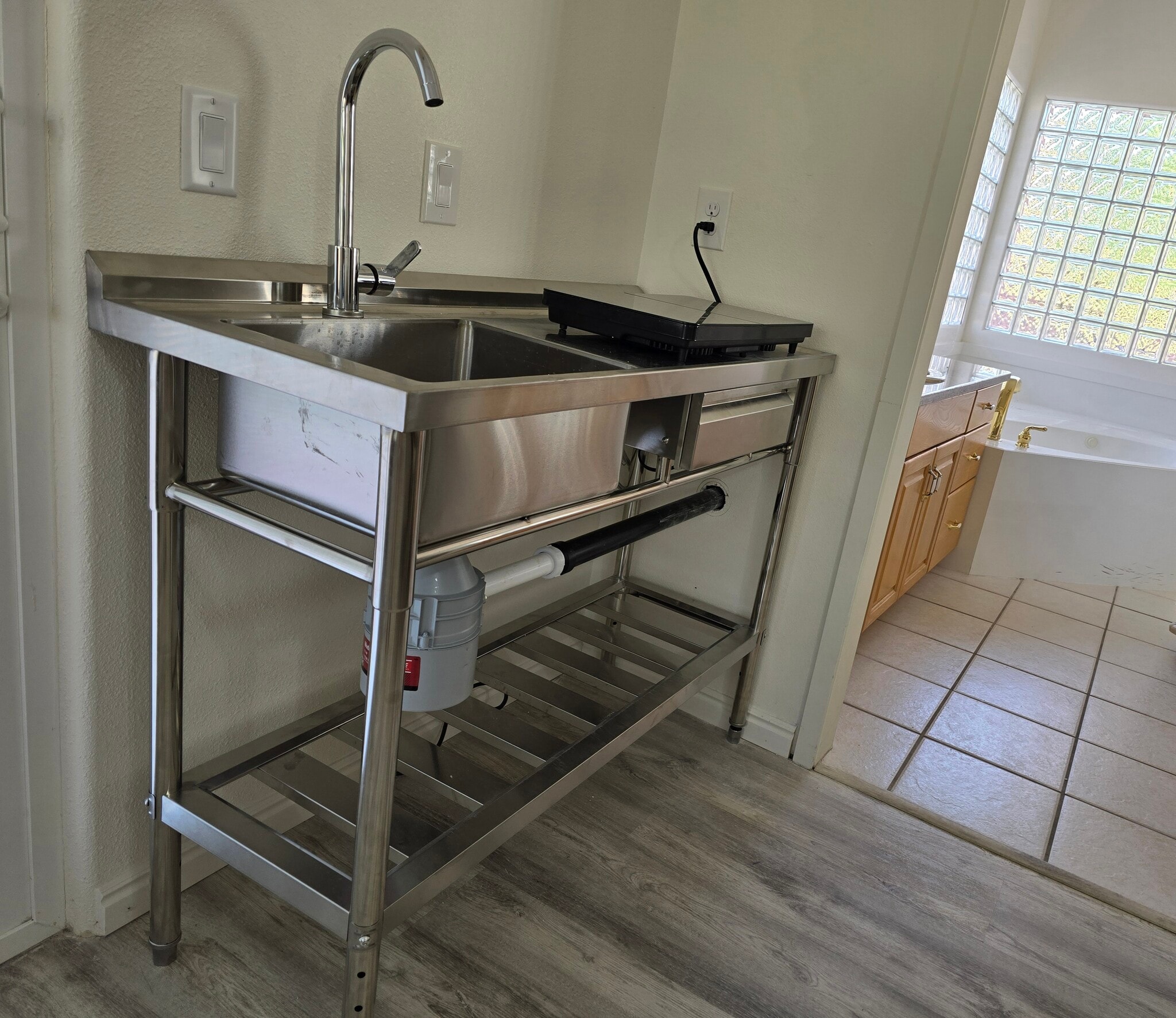 20. Brand-new kitchenette in SE corner of living room (with swivel faucet) - 137 E 755 S
