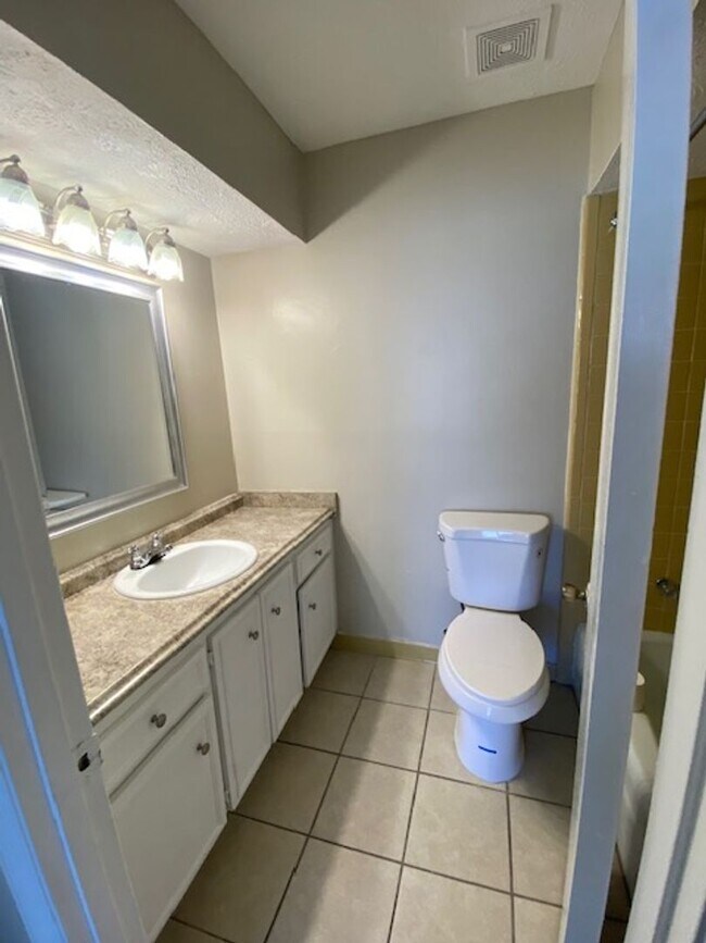 Building Photo - A Quiet Location, $200 Move-N-Special