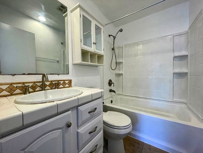 Building Photo - Updated 2-Bedroom Townhome with Garage in Resort-Style Community