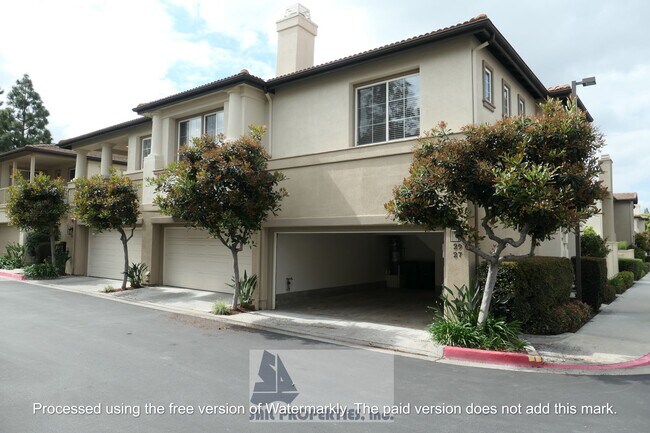 Building Photo - Welcome to this stunning 2-bedroom condo in gated community