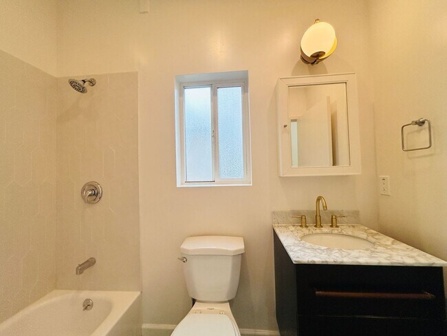 Building Photo - Chic 2-Bed, 2-Bath Home with Gated Yard in...