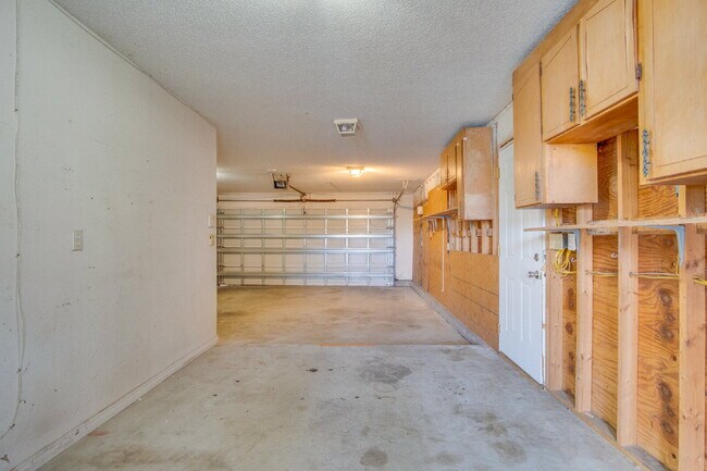 Building Photo - Live the Gulf Breeze Waterfront Life – Dock, Canal Access & Boat Lift!