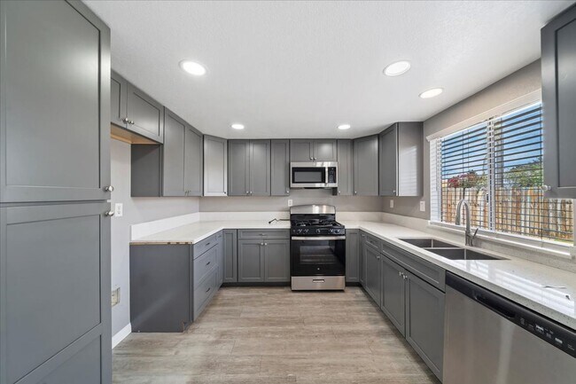Building Photo - Modern Upgrades, Remodeled Kitchen & Baths, Prime Moreno Valley Location