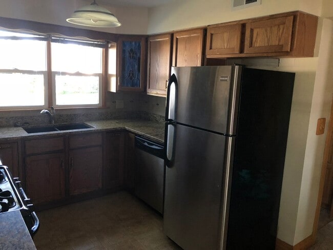 Building Photo - Affordable Colona Home With 2-Car Garage and Spacious Yard!
