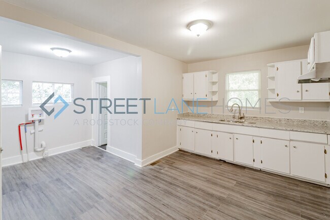 Building Photo - 8004 Rugby Ave