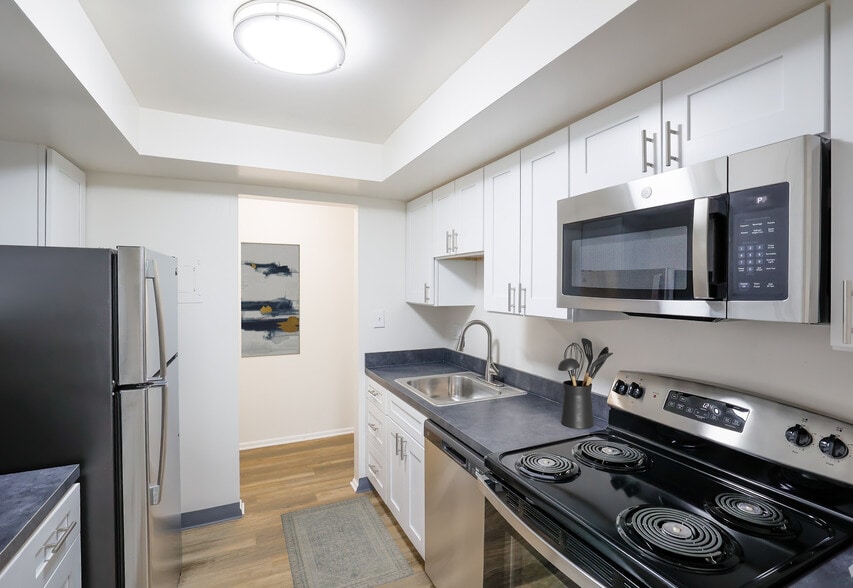 Renovated Kitchen with Stainless Steel Appliances - Village at Mayfield