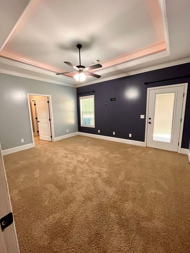 Building Photo - Spacious 3-Bedroom Home with Garage, Large...
