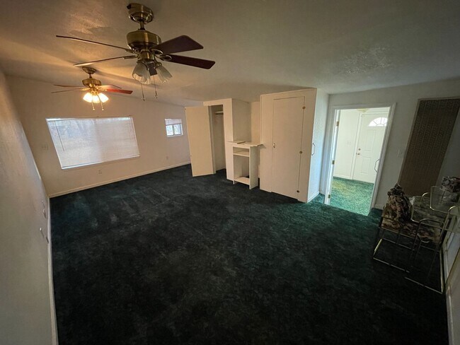 Building Photo - Paradise 3 bedroom 2 1/2 bath, large home, shop, natural landscaping.