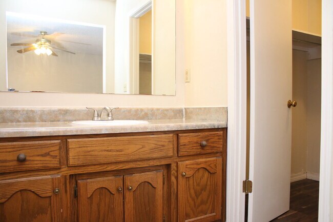 Building Photo - Spacious 4-Bedroom, 2-Bath Brick Home with Vaulted Ceilings, Fenced Yard, and Large Patio