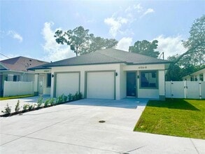 Building Photo - 4106 N Thatcher Ave