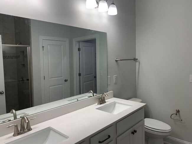 Building Photo - 4 Bedroom, 2.5 Bath, Pet Friendly Town Home with Garage Within Barefoot Resort and Golf! Availabl...