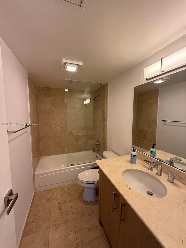 Building Photo - 10275 Collins Ave