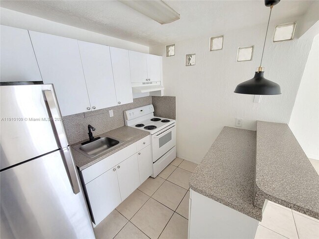 Building Photo - 4275 NW S Tamiami Canal Dr